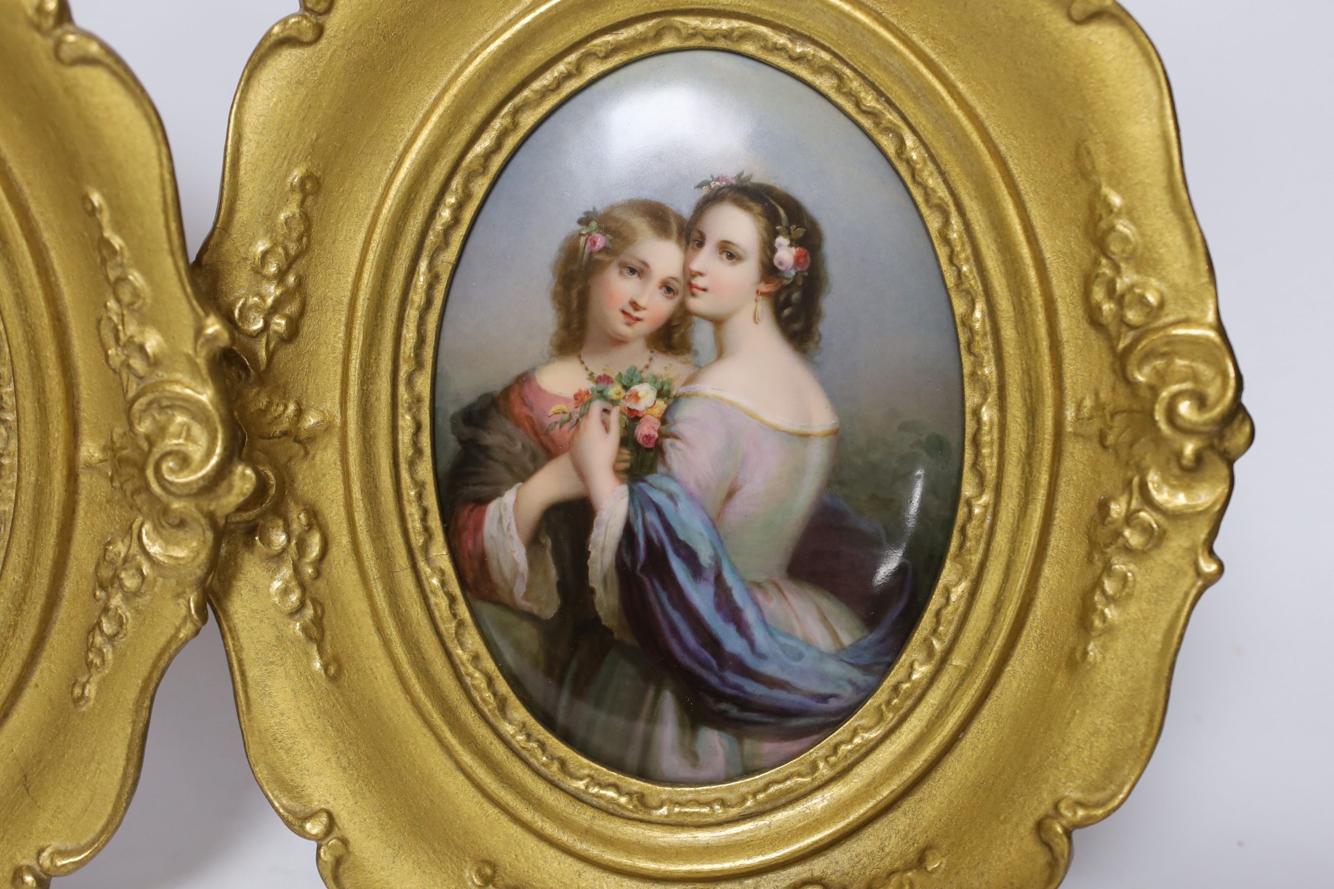 A pair of framed 19th century Paris porcelain oval porcelain plaques, painted with Flora and two ladies, 18x13cm excl frame